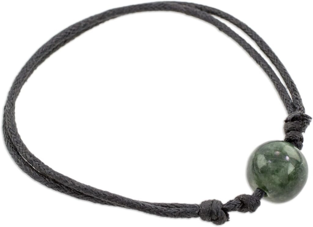 NOVICA Artisan Handmade Jade Pendant Bracelet Adjustable Dark Green from Guatemala Cotton Cord Loving Life in Dark Green NOVICA Artisan Handmade Jade Pendant Bracelet Adjustable Dark Green from Guatemala Cotton Cord Loving Life in Dark Green